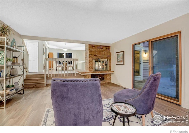 8940 W 80th Dr, Arvada, CO 80005 - living room featuring light wood-style floors