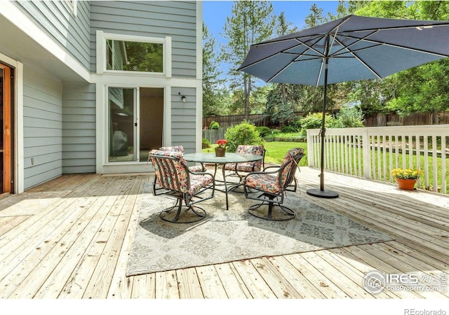 8940 W 80th Dr, Arvada, CO 80005 - wooden terrace featuring outdoor dining space