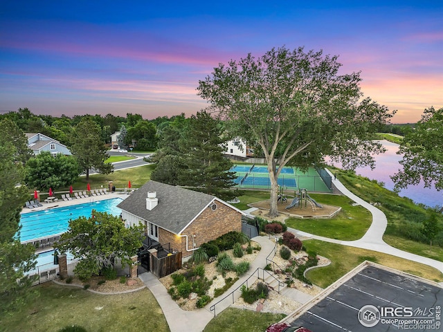 8940 W 80th Dr, Arvada, CO 80005 - aerial view at dusk of view of pool