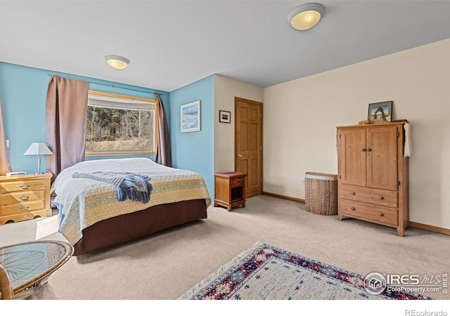 317 W 5th St, Nederland, CO 80466 - bedroom featuring light carpet and baseboards