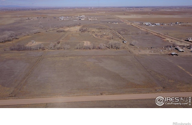 3113 County Road 17, Brighton, CO 80603 - birds eye view of property featuring a rural view
