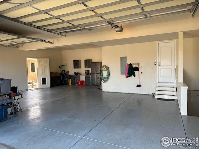 1578 Landon Ct, Windsor, CO 80550 - garage featuring electric panel and a garage door opener