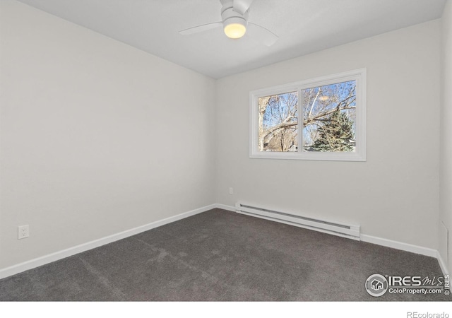 2836 Adobe Dr, Fort Collins, CO 80525 - spare room with a baseboard radiator, ceiling fan, dark carpet, and baseboards