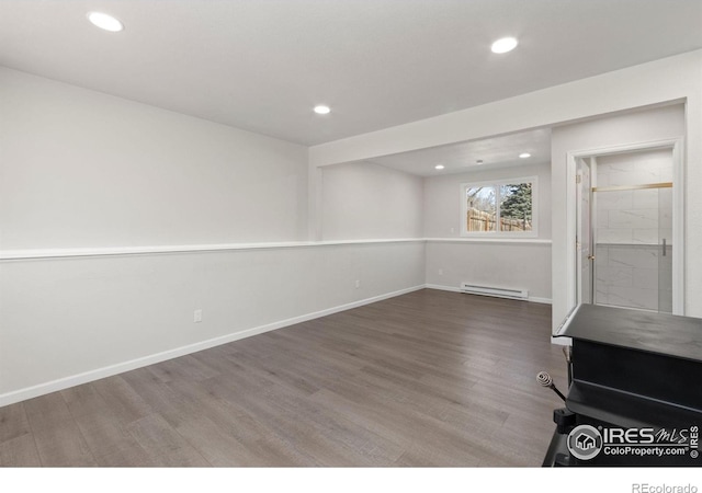 2836 Adobe Dr, Fort Collins, CO 80525 - interior space with a baseboard radiator, recessed lighting, baseboards, and wood finished floors