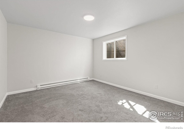 2836 Adobe Dr, Fort Collins, CO 80525 - spare room featuring baseboards, a baseboard heating unit, and carpet