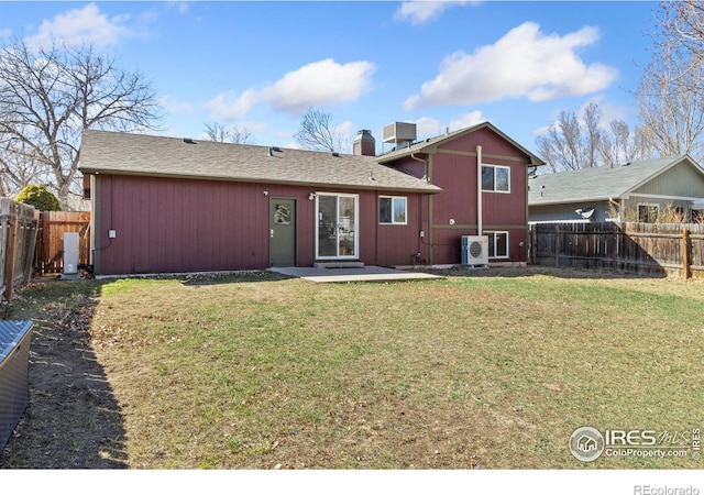 2836 Adobe Dr, Fort Collins, CO 80525 - rear view of property featuring a chimney, a fenced backyard, ac unit, a patio, and a yard