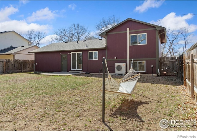 2836 Adobe Dr, Fort Collins, CO 80525 - back of house with a fenced backyard, ac unit, a yard, and a patio area