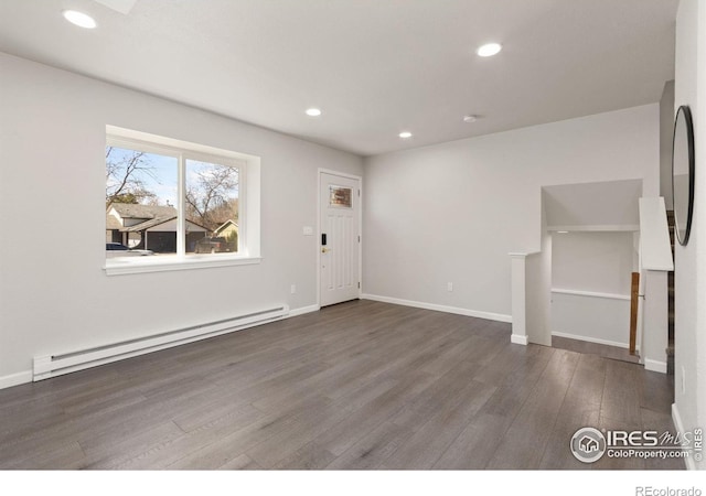2836 Adobe Dr, Fort Collins, CO 80525 - unfurnished living room with a baseboard radiator, recessed lighting, baseboards, and wood finished floors
