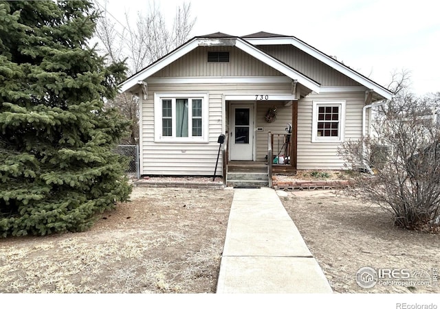 730 Lake St, Fort Morgan, CO 80701 - bungalow-style home with fence