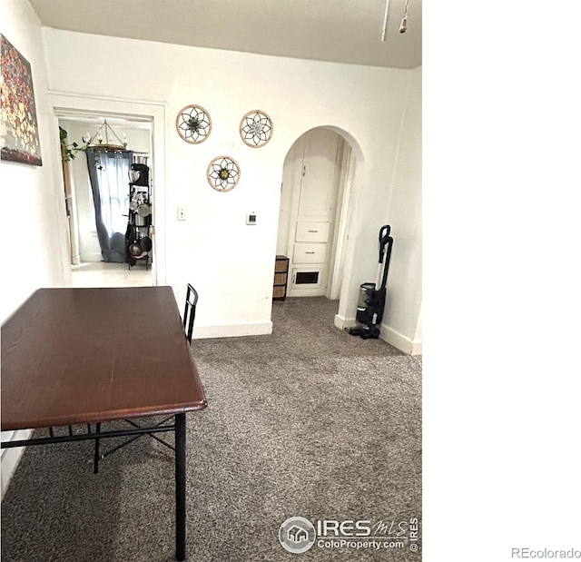 730 Lake St, Fort Morgan, CO 80701 - unfurnished office featuring arched walkways, baseboards, and carpet