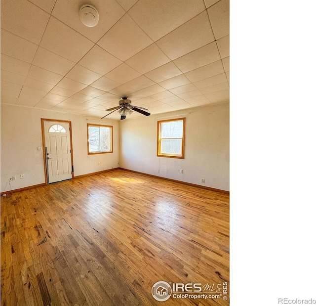 3828 Mckinley Ave, Wellington, CO 80549 - interior space featuring hardwood / wood-style floors, baseboards, and a ceiling fan