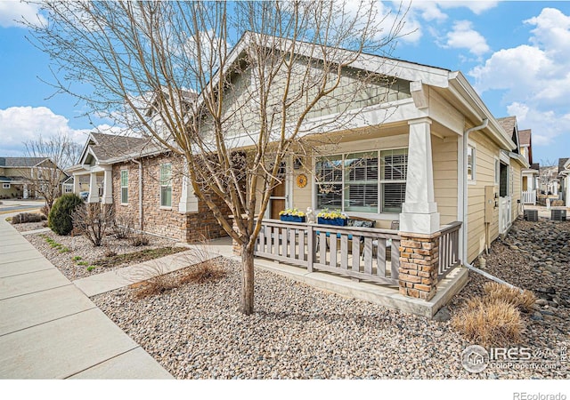 view of front of property with a residential view and covered porch