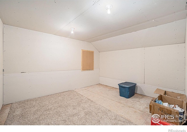 interior space featuring lofted ceiling