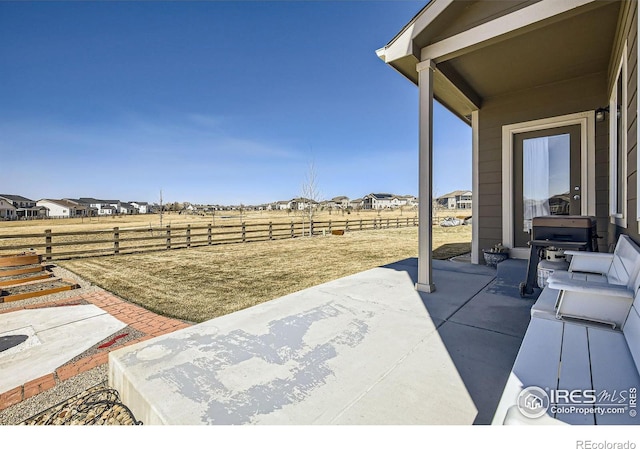 5460 Homeward Dr, Timnath, CO 80547 - view of patio / terrace featuring a grill and fence