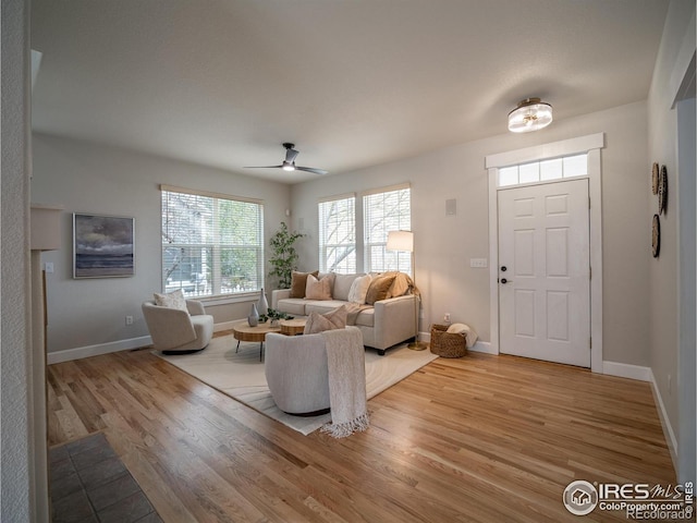 2946 Shoshone Trl, Lafayette, CO 80026 - living area with baseboards, a ceiling fan, and wood finished floors