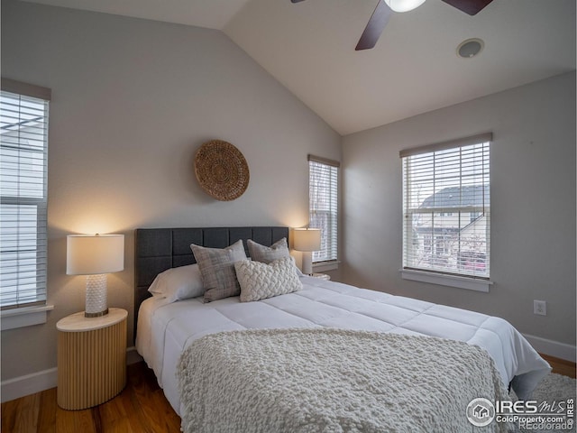 2946 Shoshone Trl, Lafayette, CO 80026 - bedroom featuring baseboards, a ceiling fan, vaulted ceiling, and wood finished floors