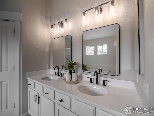 2946 Shoshone Trl, Lafayette, CO 80026 - full bath with double vanity and a sink