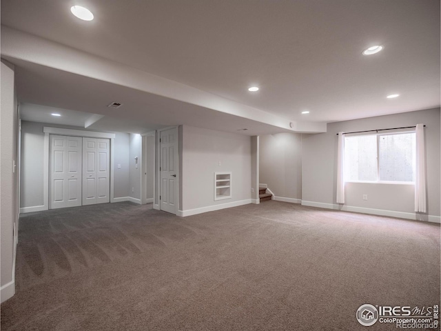 2946 Shoshone Trl, Lafayette, CO 80026 - basement featuring stairway, carpet floors, baseboards, and recessed lighting