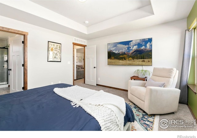 3362 Buffalo Grass Ln, Wellington, CO 80549 - carpeted bedroom with baseboards and a tray ceiling
