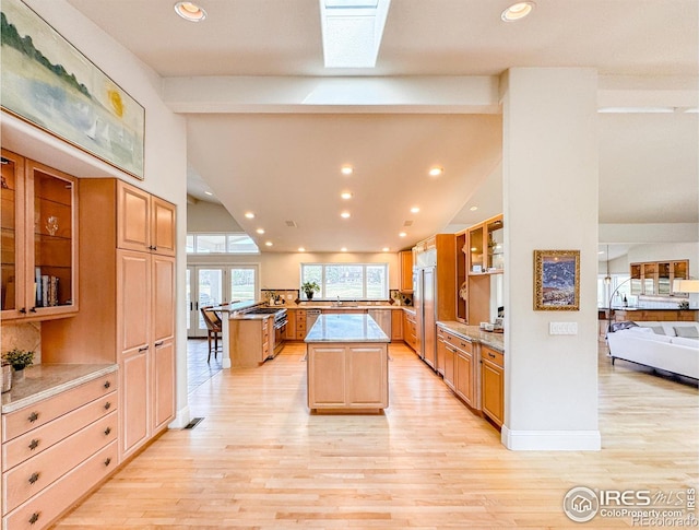 7155 Rustic Trl, Boulder, CO 80301 - kitchen featuring paneled fridge, light wood-style floors, recessed lighting, a kitchen island, and a sink