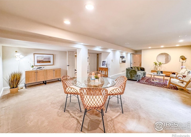 7155 Rustic Trl, Boulder, CO 80301 - dining area with light colored carpet, baseboards, and recessed lighting