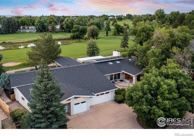 7155 Rustic Trl, Boulder, CO 80301 - aerial view at dusk of a water view, view of wooded area, and golf course view