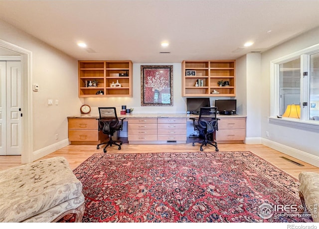 7155 Rustic Trl, Boulder, CO 80301 - home office with built in desk, light wood-type flooring, and recessed lighting