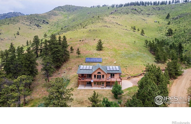 10435 Roan Mountain Rd, Loveland, CO 80538 - drone / aerial view featuring a mountain view