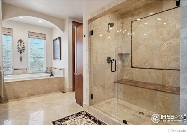 full bathroom featuring a stall shower, tile patterned flooring, recessed lighting, and a bath