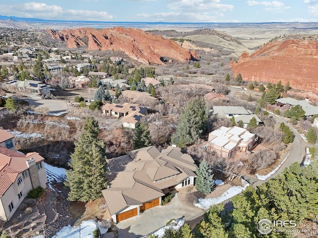 aerial view with a mountain view and a residential view