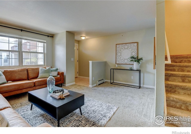 1865 Terry St Unit 3, Longmont, CO 80501 - living area with baseboards, carpet, stairway, and baseboard heating