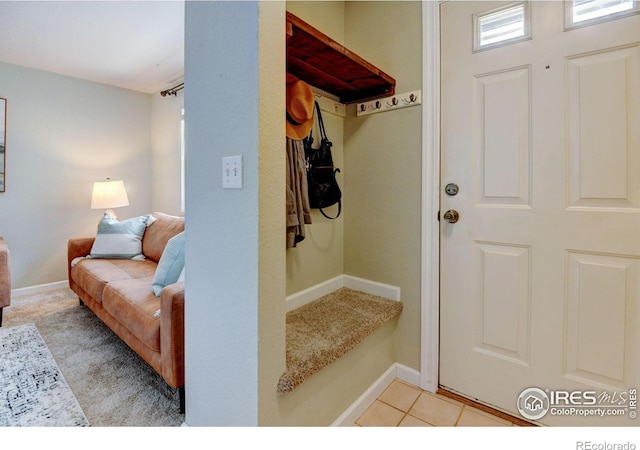 1865 Terry St Unit 3, Longmont, CO 80501 - mudroom featuring light tile patterned flooring and baseboards