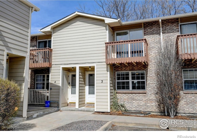 1865 Terry St Unit 3, Longmont, CO 80501 - view of front of home featuring brick siding