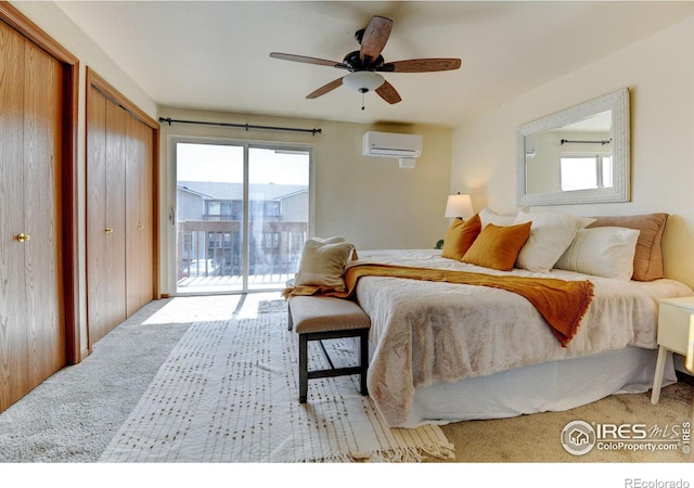 1865 Terry St Unit 3, Longmont, CO 80501 - bedroom featuring two closets, a wall mounted AC, carpet, access to outside, and ceiling fan