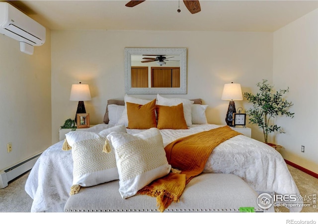1865 Terry St Unit 3, Longmont, CO 80501 - carpeted bedroom featuring baseboard heating, a wall mounted air conditioner, and a ceiling fan