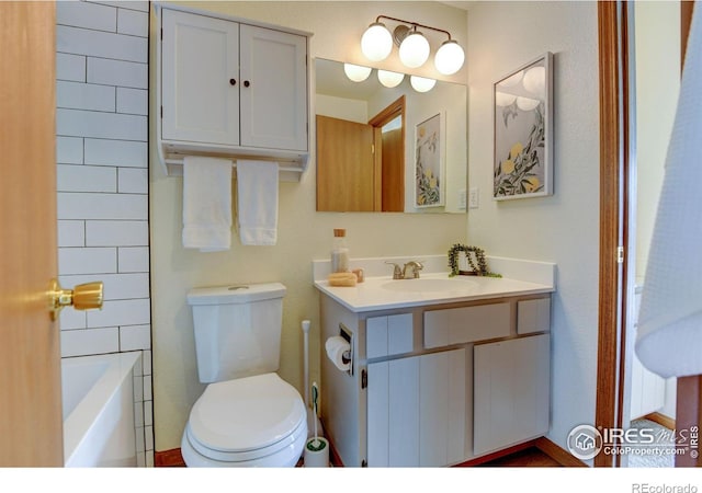 1865 Terry St Unit 3, Longmont, CO 80501 - bathroom featuring toilet, vanity, and a bath
