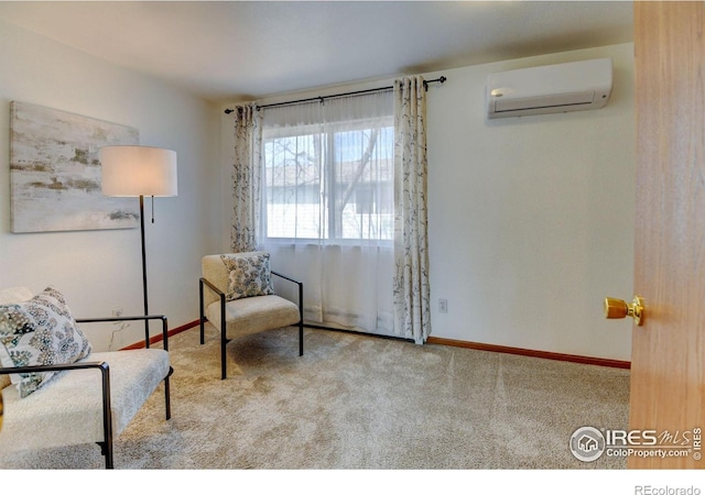 1865 Terry St Unit 3, Longmont, CO 80501 - living area with baseboards, a wall mounted AC, and carpet