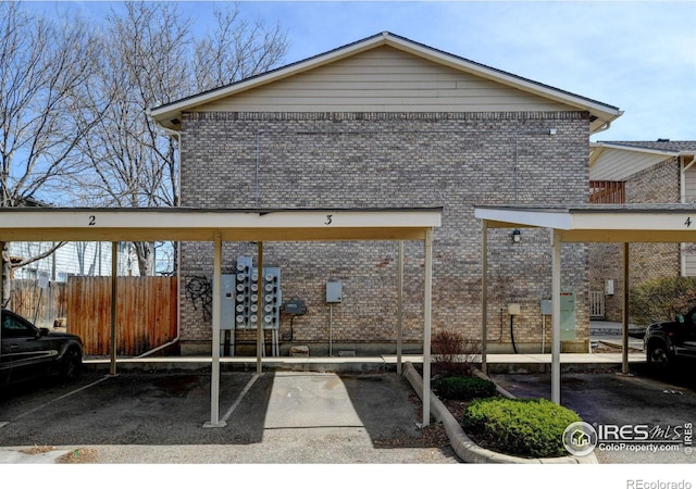 1865 Terry St Unit 3, Longmont, CO 80501 - covered parking lot with fence