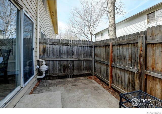 1865 Terry St Unit 3, Longmont, CO 80501 - view of patio / terrace with fence