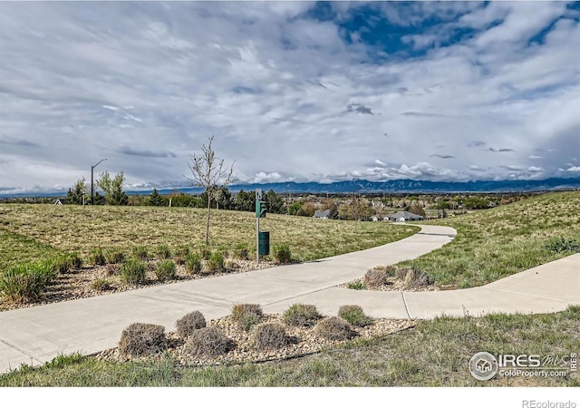 38 Morgan Cir S, Erie, CO 80516 - view of community featuring a mountain view
