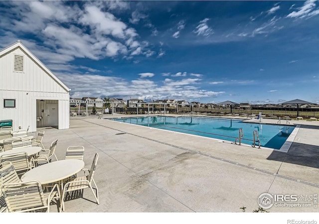 38 Morgan Cir S, Erie, CO 80516 - community pool with a patio