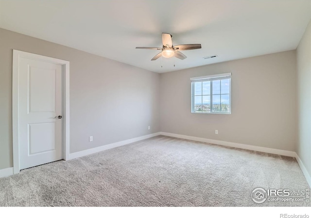 38 Morgan Cir S, Erie, CO 80516 - carpeted spare room with a ceiling fan and baseboards