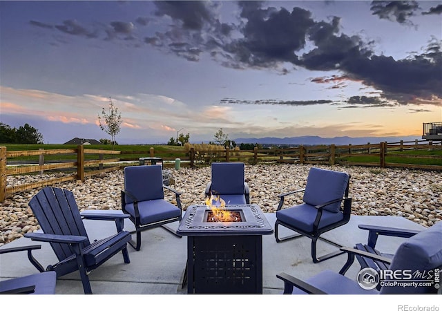 38 Morgan Cir S, Erie, CO 80516 - view of patio featuring a fire pit