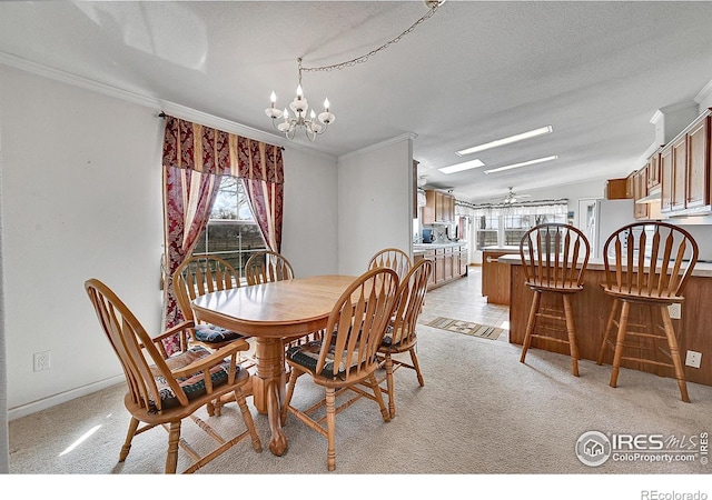 24505 County Road 53, Kersey, CO 80644 - dining space with a chandelier, plenty of natural light, crown molding, a textured ceiling, and light colored carpet