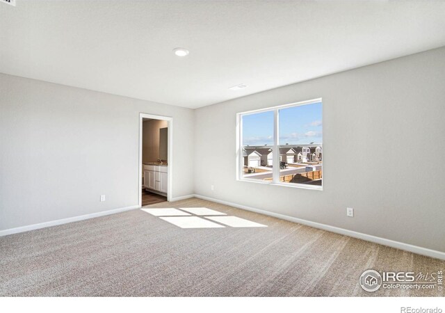 974 Cascade Falls St, Severance, CO 80550 - carpeted empty room with baseboards and recessed lighting