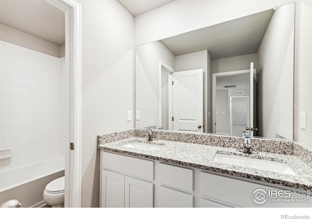 974 Cascade Falls St, Severance, CO 80550 - bathroom with double vanity and bathtub / shower combination