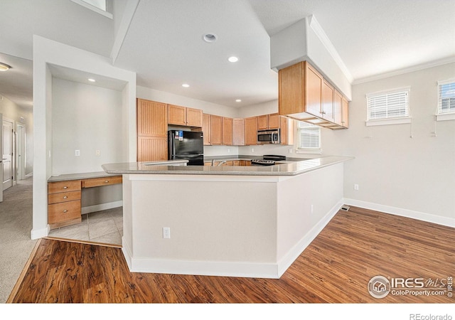 4751 Pleasant Oak Dr Unit C65, Fort Collins, CO 80525 - kitchen with recessed lighting, appliances with stainless steel finishes, baseboards, and wood finished floors