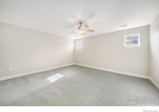 4751 Pleasant Oak Dr Unit C65, Fort Collins, CO 80525 - empty room with carpet, baseboards, visible vents, and a ceiling fan