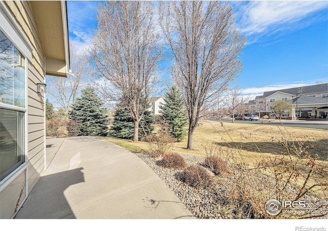 4751 Pleasant Oak Dr Unit C65, Fort Collins, CO 80525 - view of patio with a residential view