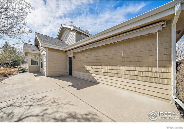 4751 Pleasant Oak Dr Unit C65, Fort Collins, CO 80525 - view of property exterior with a patio area